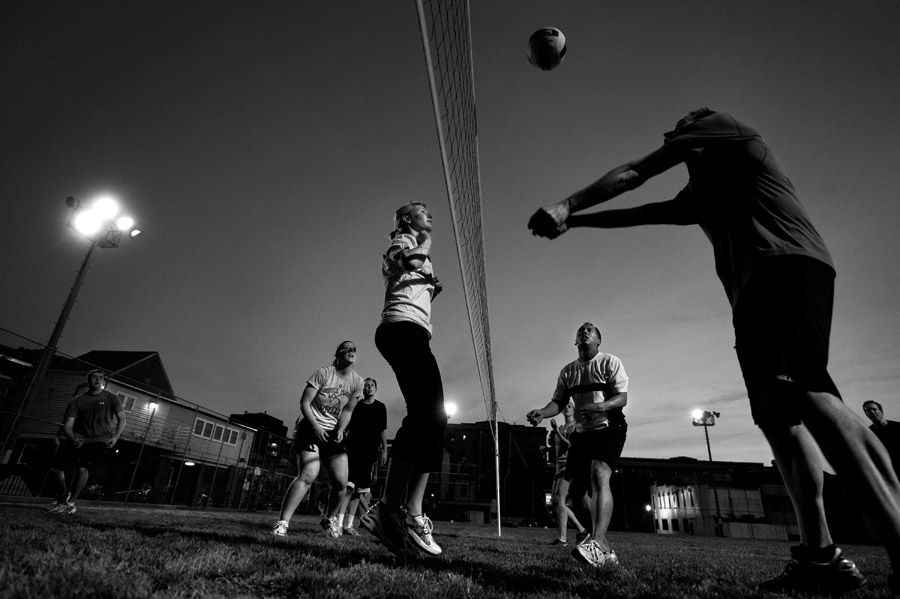 Liz Schreiner, center left to right, Stephen Affleck, Cally Stolbach, Patrick Songsanand, and Sam Murr play a game of volleyball at a field in Stead Park on Wednesday May 16, 2012 in Washington, DC. The volleyball games that were going on Wednesday evening were organized by Metro Sports Leagues.