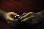 Bill Orndorff looks for parts as he puts the finishing touches on he and his son's demolition derby cars on Monday August 27, 2012 in Woodstock, VA.  He and his sons were working in preparation for Monday's derby at the Shenandoah County Fair.