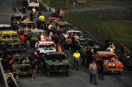 Demolition derby cars sit lined up for their respective heats prior to the beginning of the demolition derby at the Shenandoah County Fair on Tuesday August 28, 2012 in Woodstock, VA.  