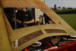 Bill Orndorff, right, works on his demolition derby car outside his home on Monday August 27, 2012 in Woodstock, VA.  Bill and his oldest son, Zach Orndorff, 18, both competed in the first night of the demolition derby of the Shenandoah County Fair.  