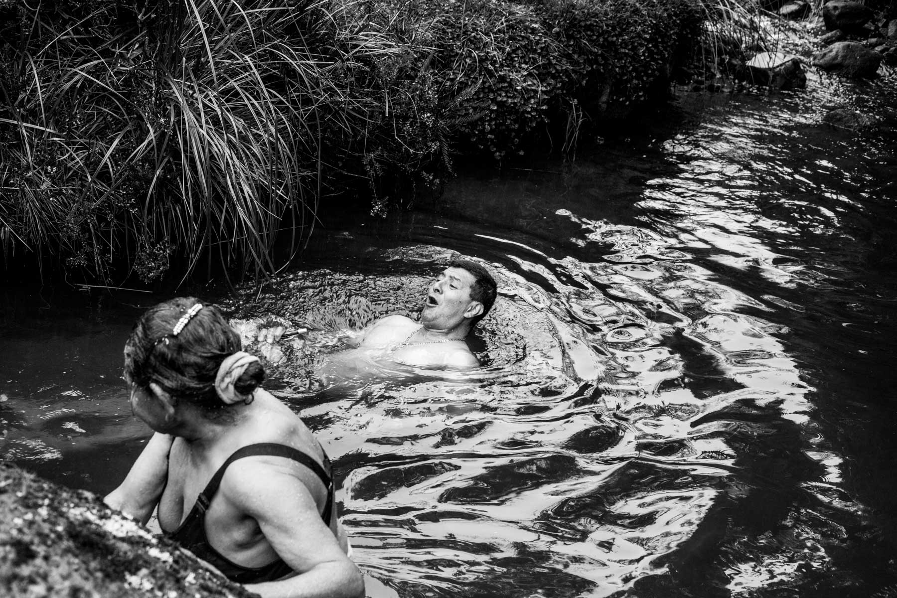 Indigenous Legacy Members of the Nasa indigenous community wash themselves in the icy waters of the Páramo de Pisnos as part of the cleansing ritual of the 'Khabu fxizehnxi' ('Refreshing of the Batons”), one of the five main rituals of the Nasa indigenous people of the Cauca region in Colombia. Cauca region, Colombia, January 2019.